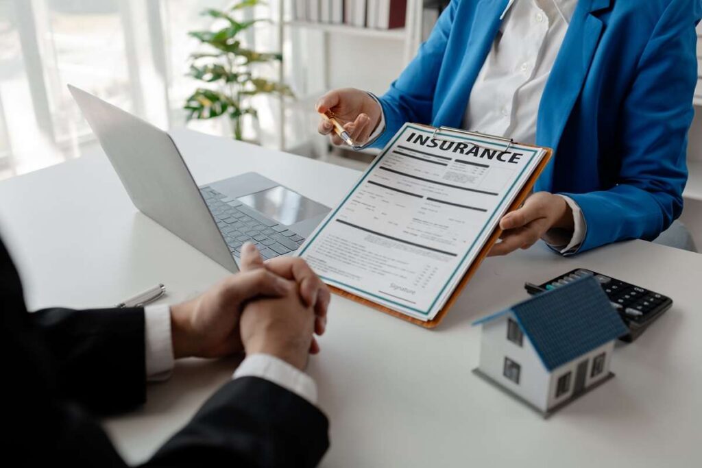 A consultant speaking with their client about an insurance claim