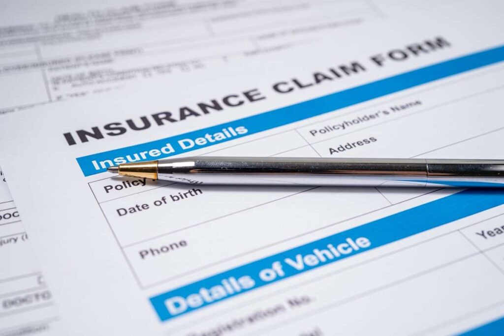 A pen on an insurance claim form