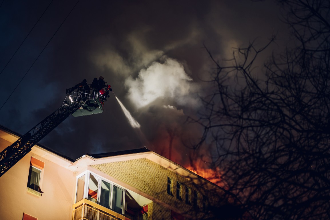 Firefighters putting out a house fire