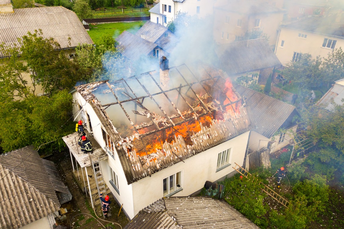 Firefighters fighting a house fire