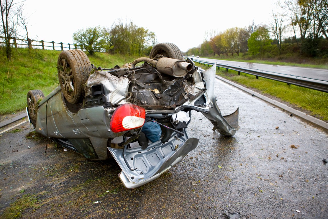 A car flipped onto its roof after a severe car accident